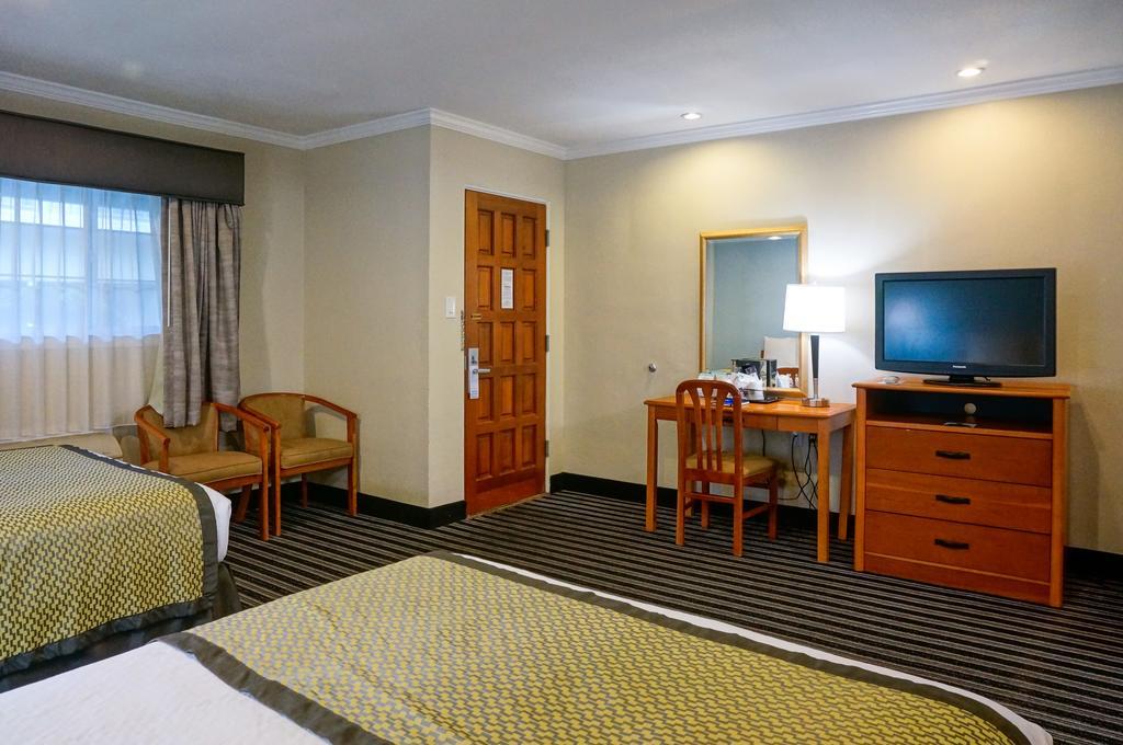 Hotel Parmani Palo Alto Bagian luar foto