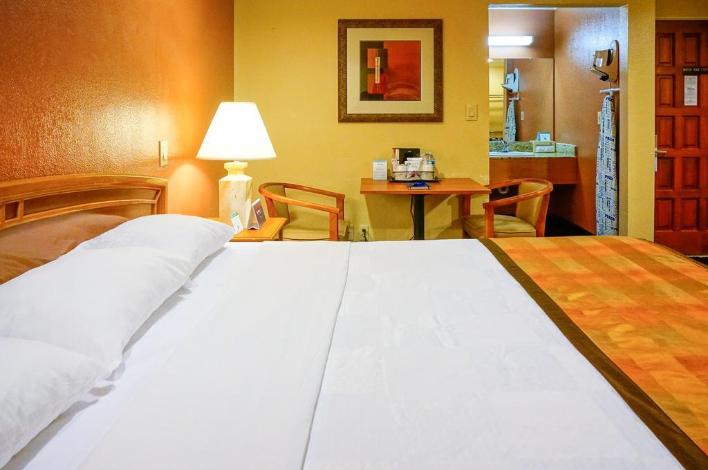 Hotel Parmani Palo Alto Bagian luar foto