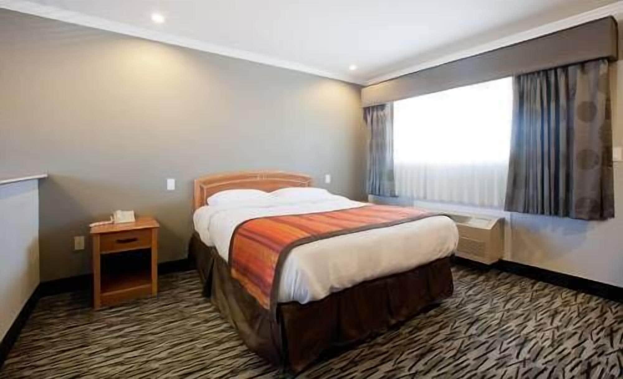 Hotel Parmani Palo Alto Bagian luar foto