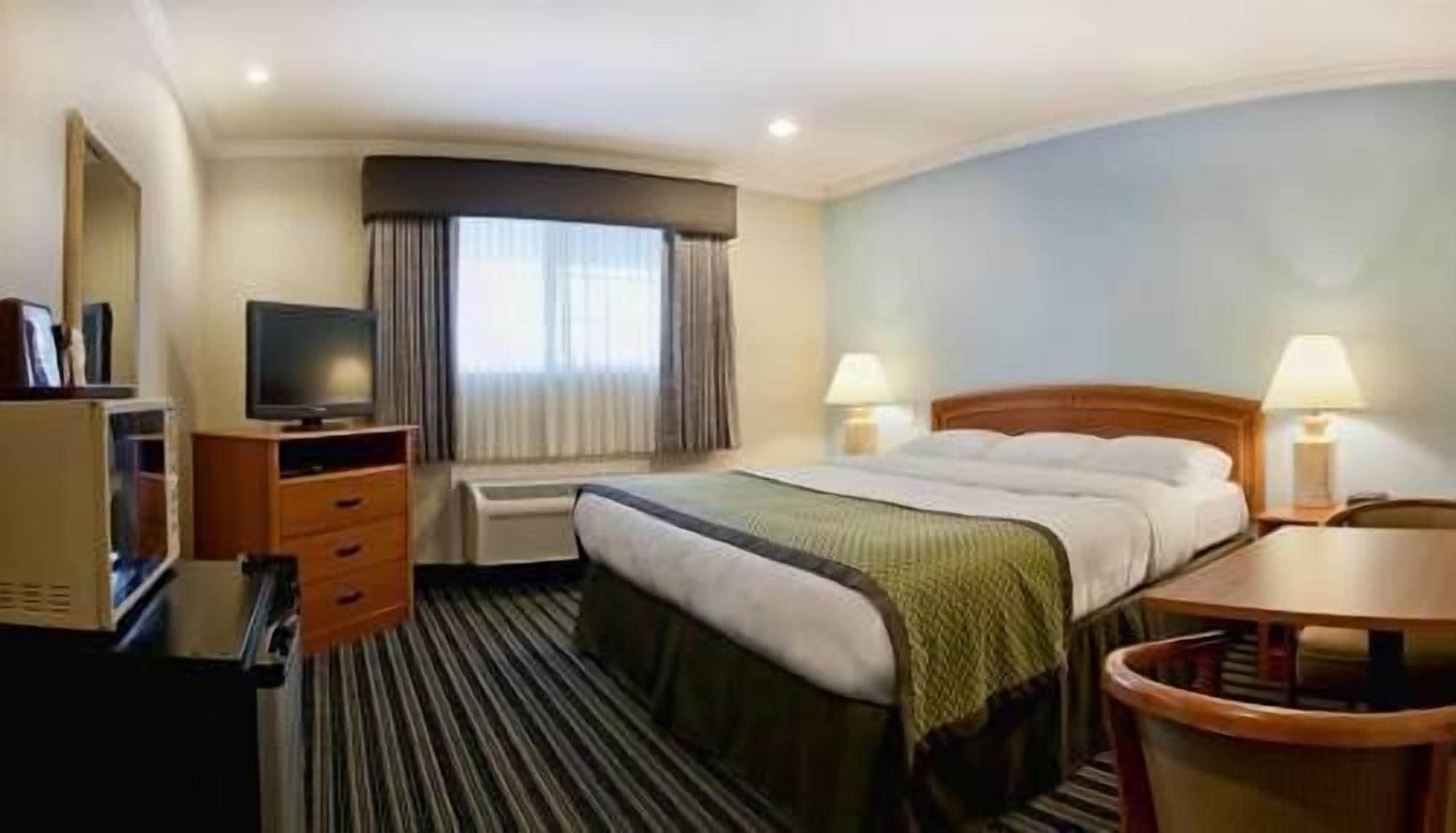Hotel Parmani Palo Alto Bagian luar foto