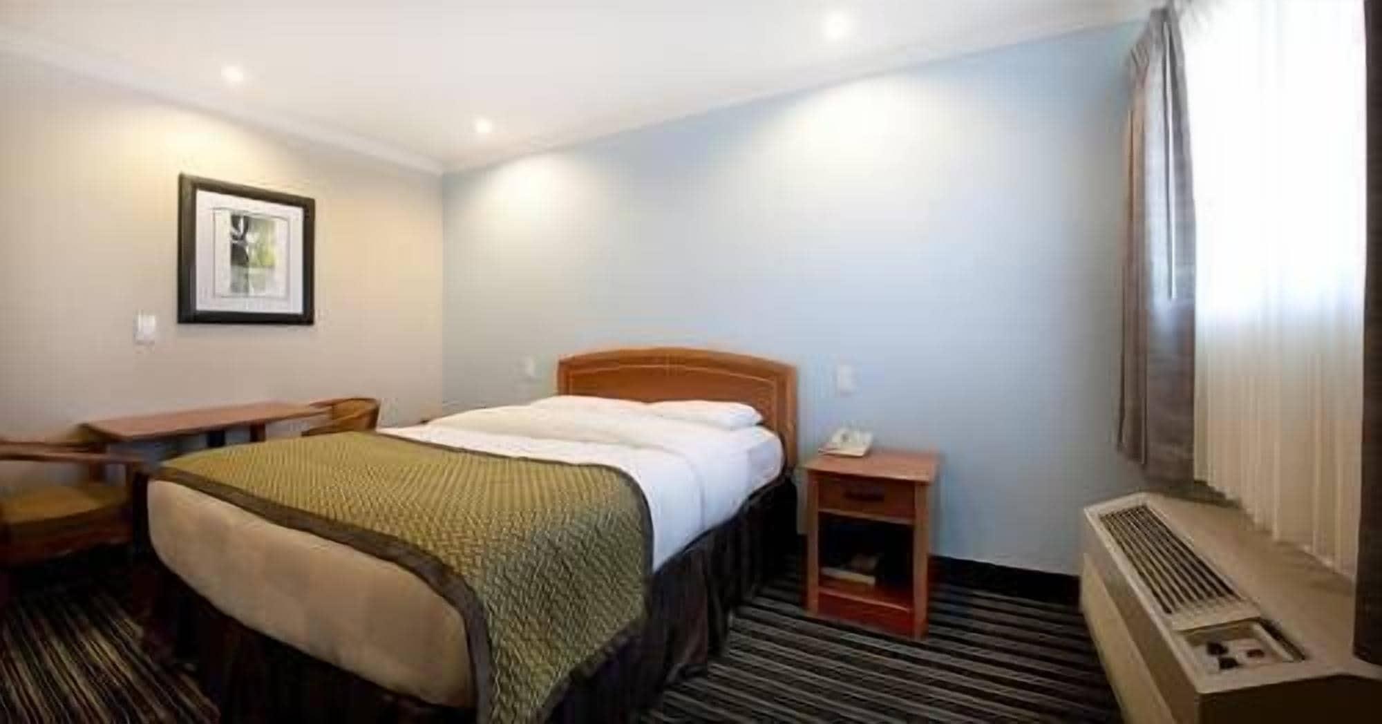 Hotel Parmani Palo Alto Bagian luar foto