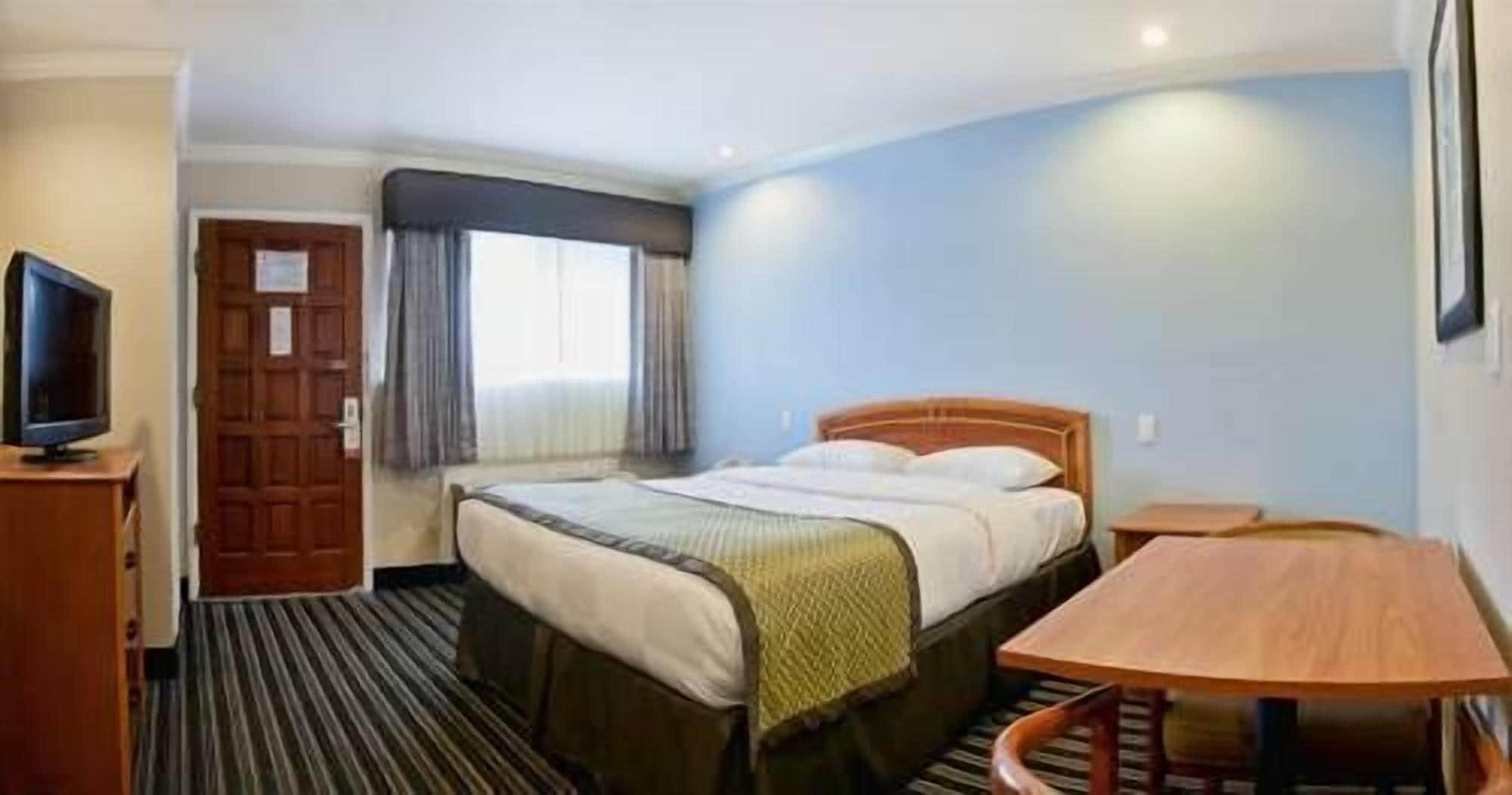 Hotel Parmani Palo Alto Bagian luar foto